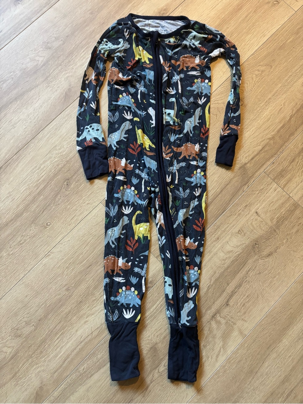 Little Sleepies Black Dinosaur Print Footed One-Piece
